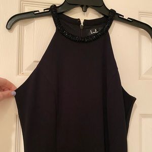 Lulus. Black floor length dress with beaded neckline. Size S.